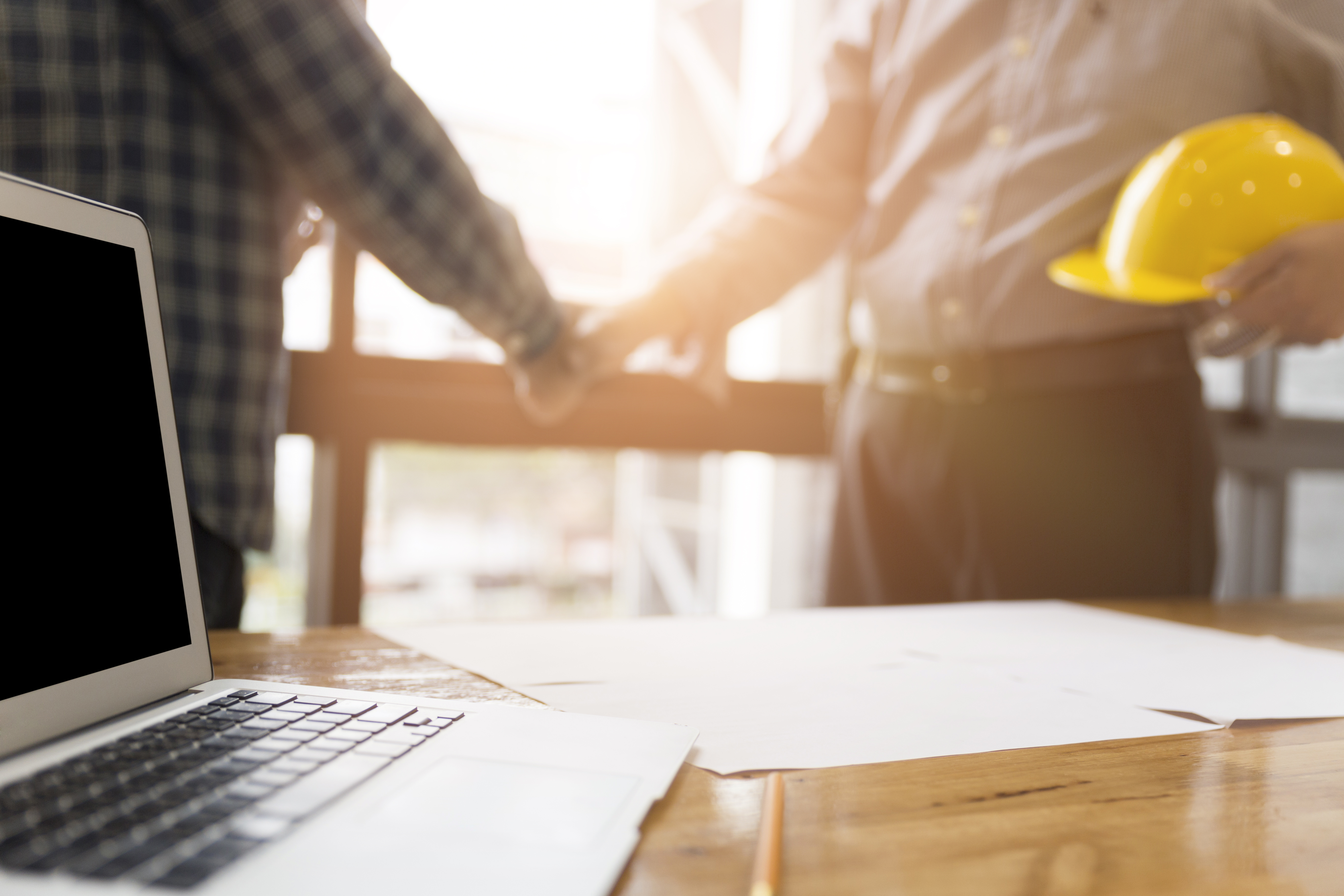Business owners shaking hands