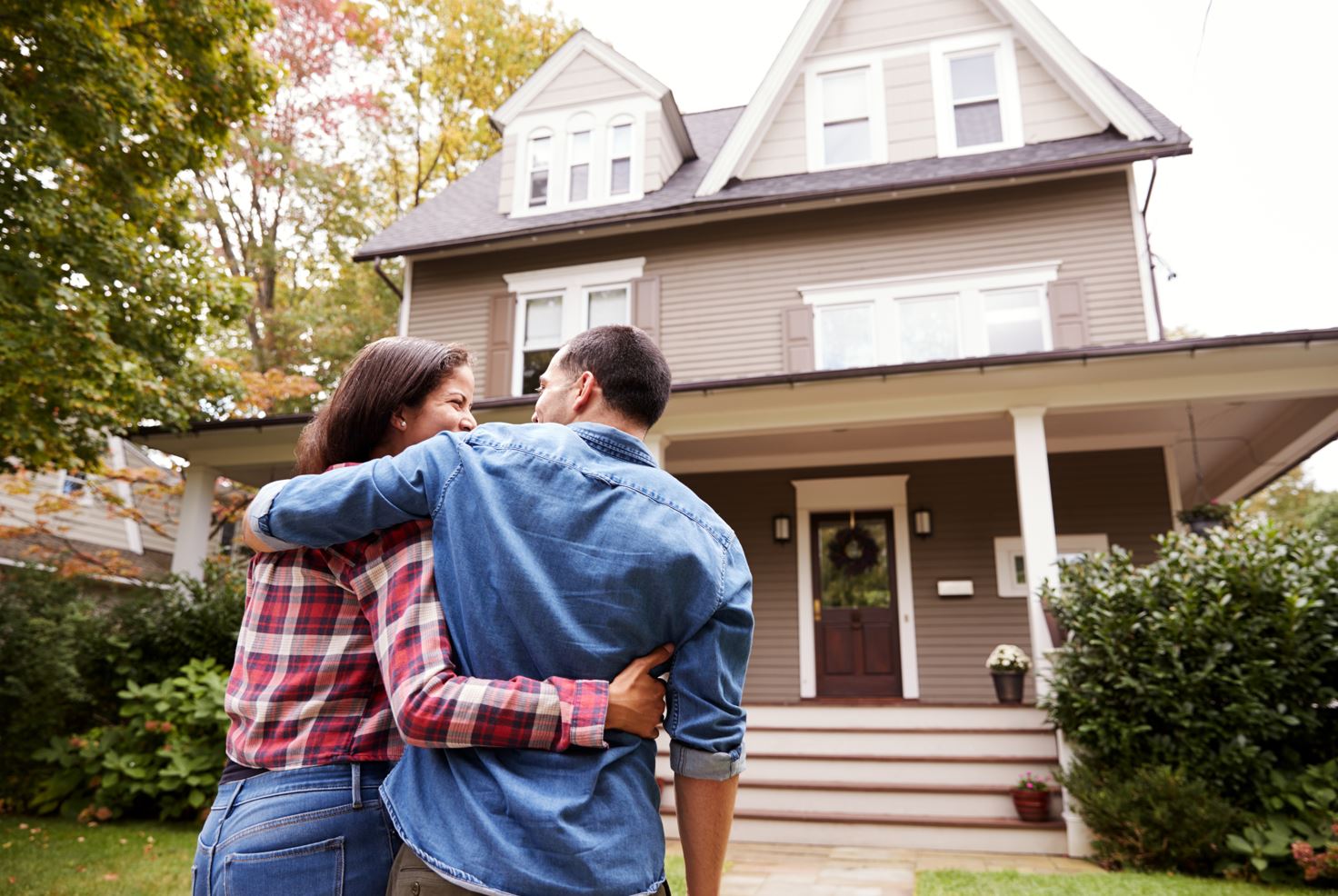 Couple Looking at House