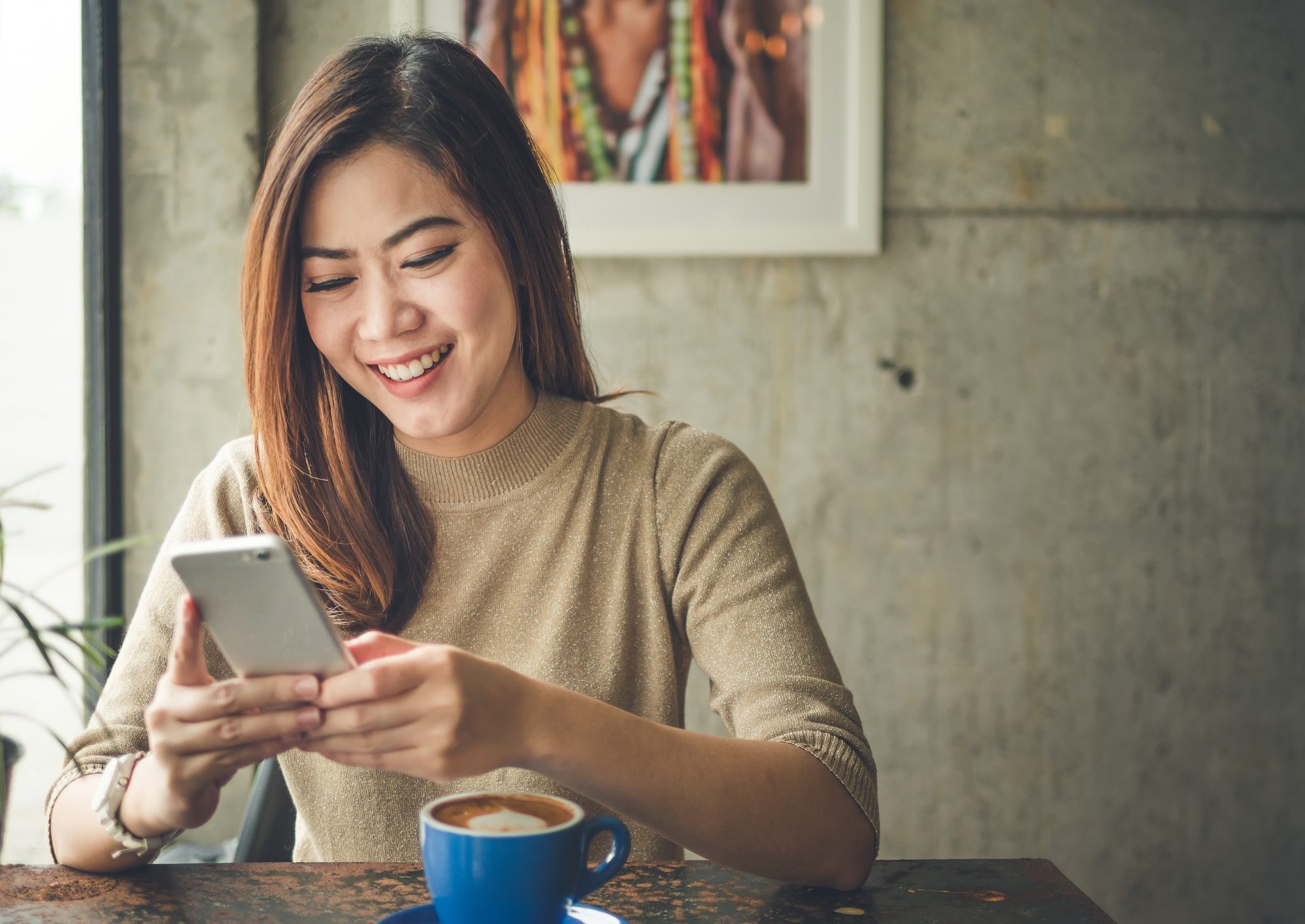 Woman using mobile banking