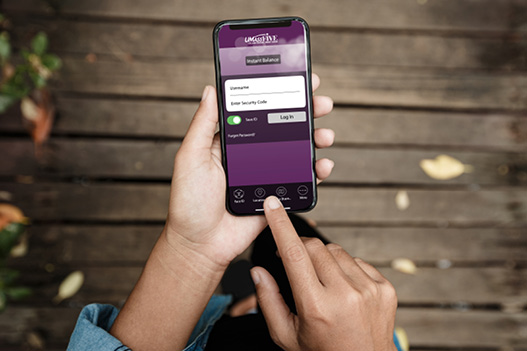 Member using UMassFive mobile banking app